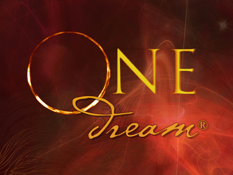 A card that says "ONE Dream®: The Transformative Journey" on it.